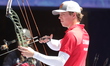 Mathias Fullerton of Denmark competes against Prathamesh Balchandra Fuge of India (not in...