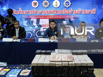 An official of the Narcotics Control Board displays a confiscated 154 kilograms of heroin hidden in their van to be smuggled from Thailand's... by Anusak Laowilas/NurPhoto