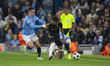 Phil Foden #47 of Manchester City F.C. is in a tussle with Qazim Laci #20 of AC Sparta Pra...