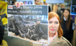 Protesters are seen outside city hall rallying against conditions in cat shelters in Warsa...