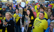 Protesters are seen outside city hall rallying against conditions in cat shelters in Warsa...