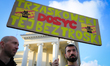 Protesters are seen outside city hall rallying against conditions in cat shelters in Warsa...