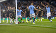 Nathan Ake #6 of Manchester City F.C. celebrates his goal during the UEFA Champions League...