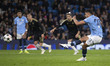 Matheus Nunes #27 of Manchester City F.C. scores from the penalty spot during the UEFA Cha...