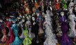 Traders at the Jamaica Market offer shoppers crafts for the Day of the Dead celebrations i...