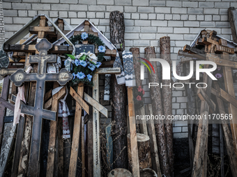 Wooden crosses in the cemetery of Slavutich, city of the Chernobyl nuclear reactor workers, in the north of Ukraine, on August 25, 2014.  Th...