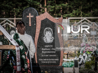 Visitor in the cemetry of Slavutich, city of the workers in Chernobyl nuclear plant, Ukraine, on August 25, 2014.  The Chernobyl disaster wa...