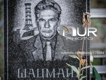 Tombstone engraved with the face of a worker in the Chernobyl nuclear plant in the cemetery of Slavutich city, Ukraine, on August 25, 2014....