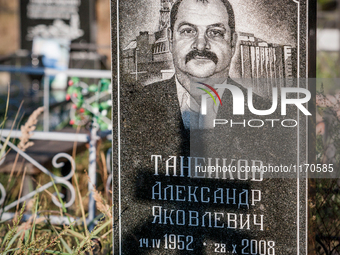 Tombstone engraved with the face of a fireman in the Chernobyl nuclear plant in the cemetery of Slavutich city, Ukraine, on August 25, 2014....