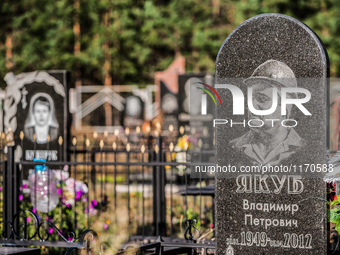 Tombstone engraved with the face of a worker in the Chernobyl nuclear plant in the cemetery of Slavutich city, Ukraine, on August 25, 2014....