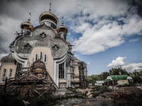 Works in the new church of Slavutich, Ukraine, city of the relocated workers after the accident of the Chernobyl nuclear plant. In the right...