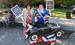 Lynn from Paramus and Kathy from Woodridge, N.J., with their dog Avery Finn, pose for a ph...