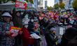Hundreds of protesters gather at the Candlelight March rally near City Hall Station on Sej...
