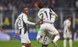 Timothy Weah celebrates with Pierre Kalulu and Nicolo Fagioli during the Serie A match bet...
