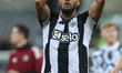 Joelinton of Newcastle United applauds the fans after their win in the Carabao Cup Round o...