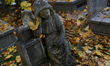 A tombstone in the form of a sculpture stands at the Rakowicki Cemetery during preparation...