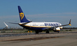 A Boeing 737 MAX 8-200 from Ryanair is on the runway ready to take off from Barcelona airp...