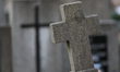 A tombstone in the form of a cross stands at the Rakowicki Cemetery during preparations fo...