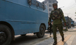 Indian paramilitary troopers patrol near the encounter site in Srinagar, Indian Administer...