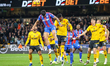 Number 12, Daniel Munoz of Crystal Palace (second from left), heads the ball during the Pr...