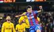 Number 12, Daniel Munoz of Crystal Palace, is in action in the air during the Premier Leag...