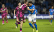 Kyle Wootton #19 of Stockport County F.C. is challenged by Harvey Bunker #16 of Forest Gre...