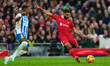 Liverpool's Mohamed Salah shoots and scores their second goal during the Premier League ma...
