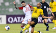 Steven Nzonzi (R) of Sepahan SC battles for the ball with Marcus Vinicius of Sharjah FC du...