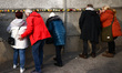 Flowers at Berlin Wall Memorial after the commemoration ceremony marking the 35th annivers...