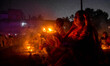 Devotees offer prayers by lighting oil lamps and incense sticks to Sri Loknath Brahmachari...