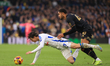 Brenden Aaronson (Leeds United) is fouled by Jonathan Varane (QPR) during the Sky Bet Cham...