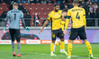 GKS Katowice players Dawid Kudla, Lukas Klemenz, and Arkadiusz Jedrych participate in the...