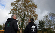 Two members of the GNSA (National Group of Trees Survey) stand in front of a plane tree wh...