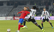 Daniel Birligea and Franck TCHASSEM are in action during the Superliga match between Unive...