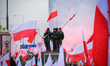 People take part in marking the 106th independence celebration in Warsaw, Poland on 11 Nov...