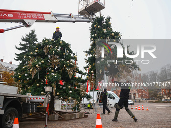Workers are erecting a Christmas Tree at the Podgorski Square in Krakow, Poland on November 12th, 2024.  by Beata Zawrzel/NurPhoto