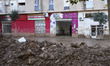 Scenes of devastation in the streets of Benetusser after the passing of the flood, army, f...