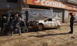 Scenes of devastation in the streets of Benetusser after the passing of the flood, army, f...