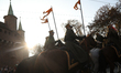 Representative vehicles of uniformed services and horse formations parade during the Indep...