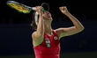 Ena Shibahara of Japan celebrates the victory during the Billie Jean King Cup match betwee...