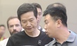 Lei Jun, founder of Xiaomi Technology Corp, visits cars of various brands at the 2024 Guan...