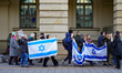 A demonstration in Munich, Germany, on November 16, 2024, includes pro-Palestinian demonst...
