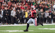 Wisconsin Badgers running back Tawee Walker #3 finds a seam on the edge against the Oregon...