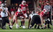 Wisconsin Badgers offensive lineman Joe Huber #60 and Wisconsin Badgers offensive lineman...