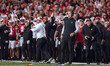 Wisconsin Badgers Head Coach Luke Fickell and the Wisconsin Badgers sideline react to a pe...