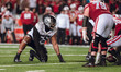 Oregon defensive lineman Derrick Harmon #55 stands in a stance before the snap against the...