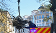 A State Emergency Service worker helps load a fragment of a Russian missile removed from a...