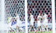 Marselino Ferdinan of Indonesia celebrates scoring their first goal with teammates during...
