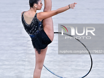 Habiba Aly of Egypt performs the Hoop exercise during the International Rhythmic Gymnastics Tournament ''Sky Grace 2024'' at Aspire Zone Fou... by Noushad Thekkayil/NurPhoto