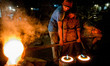 Pouring melted brass into the most to make propeller, in Dhaka, Bangladesh, on April 28, 2...